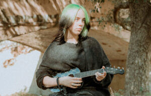 Billie Eilish with her custom signature Fender ukulele