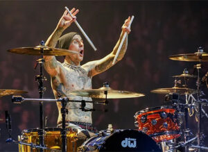 Travis Barker of Blink 182 on stage playing drums
